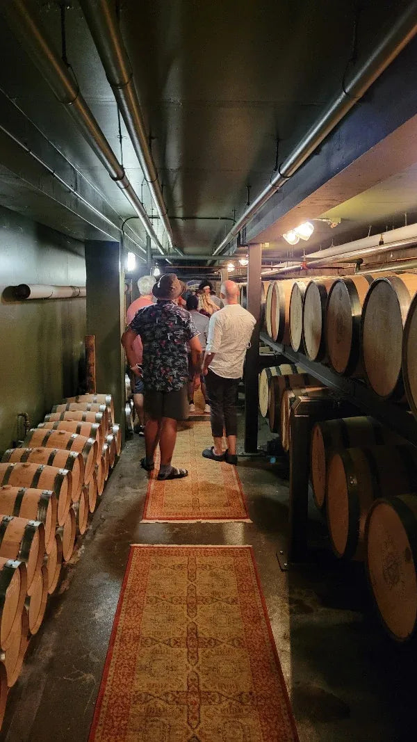 Barrels aging beneath Chuckanut Bay Distillery